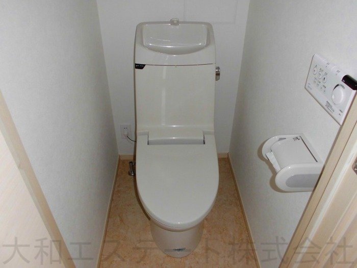 トイレ(クイーンズコート春)